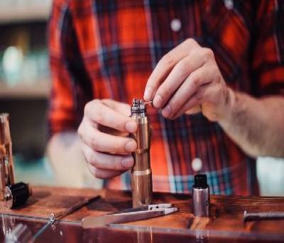 Man Cleaning Coils