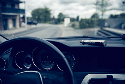 Vape Device on Car Dashboard