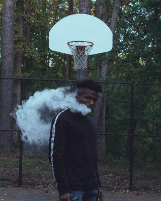 Vaping On A Basketball Court