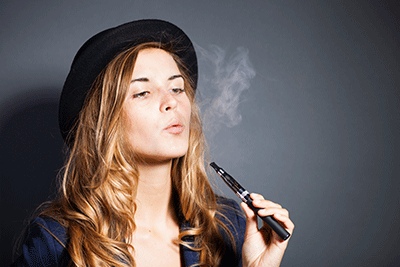 Woman Using a Vape Pen